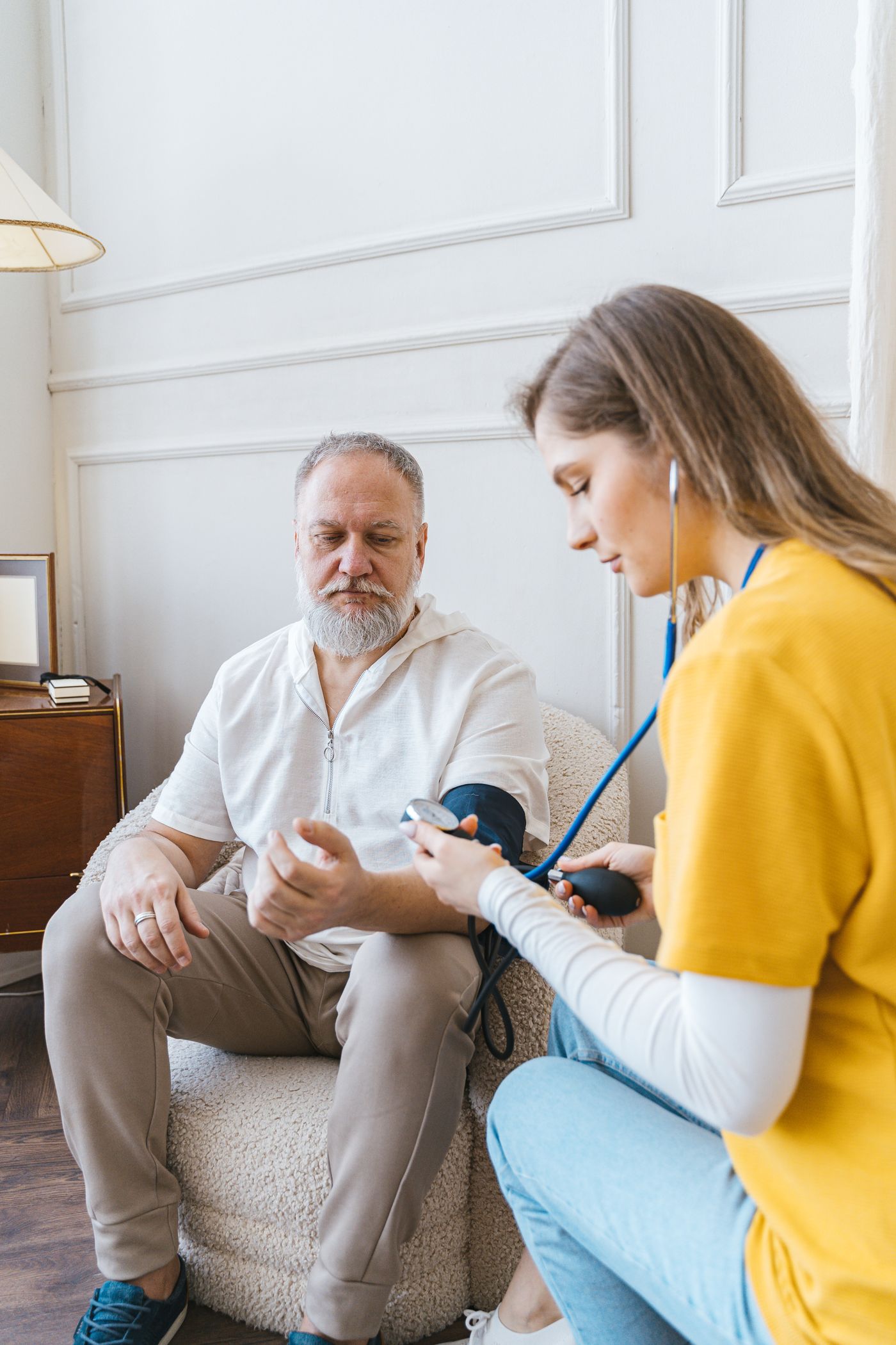 Older man talking with his GP